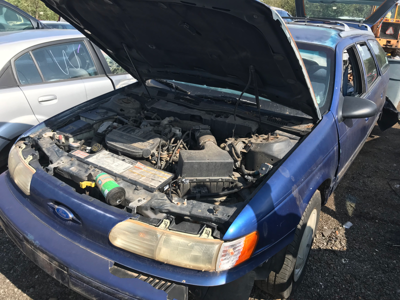 Ford Taurus wagon. One of the few car I saw with most of the engine intact.